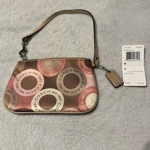 Coach 1941 wristlet wallet clutch in pink tan color